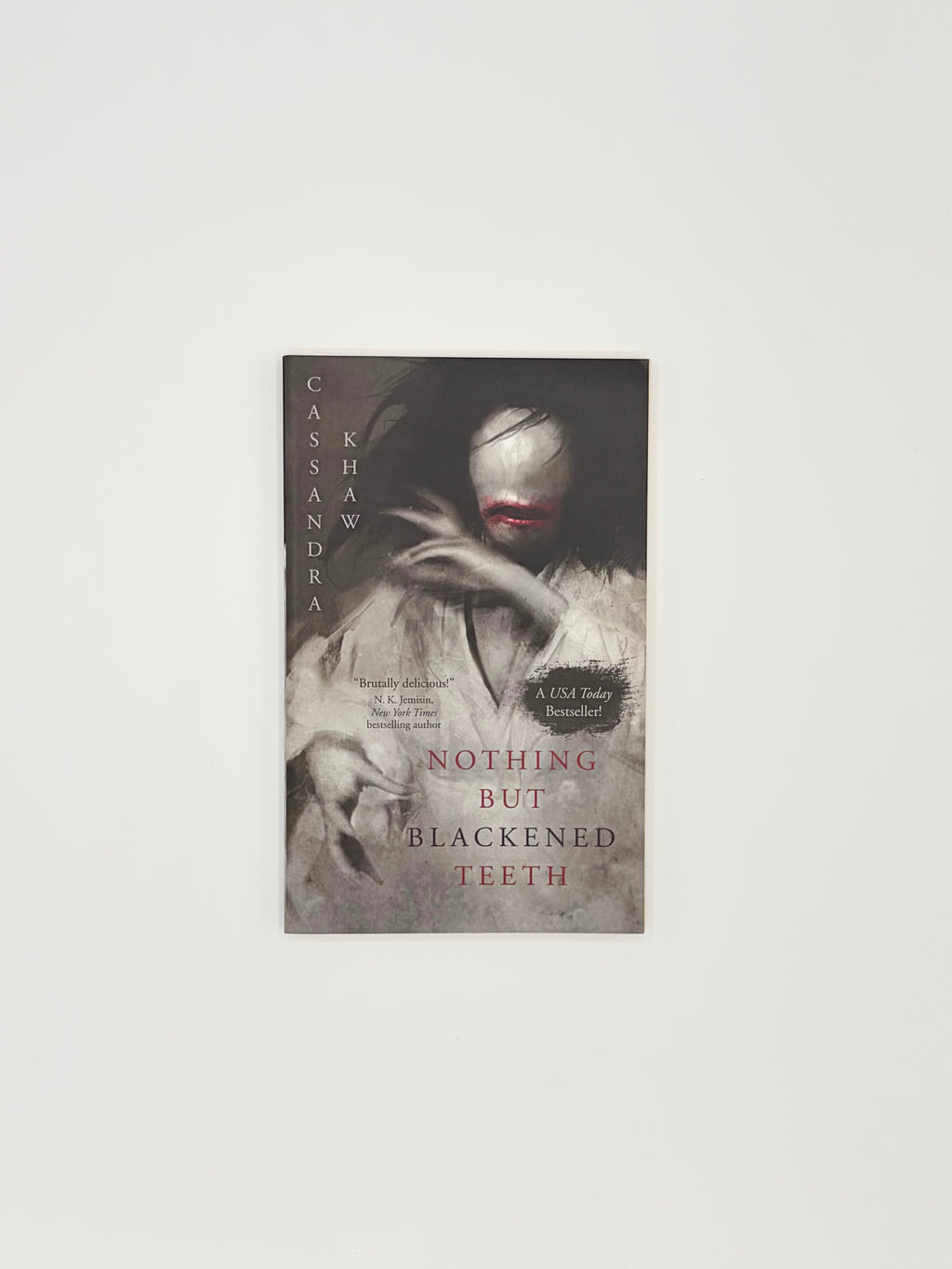 Nothing but Blackened Teeth by Cassandra Khaw