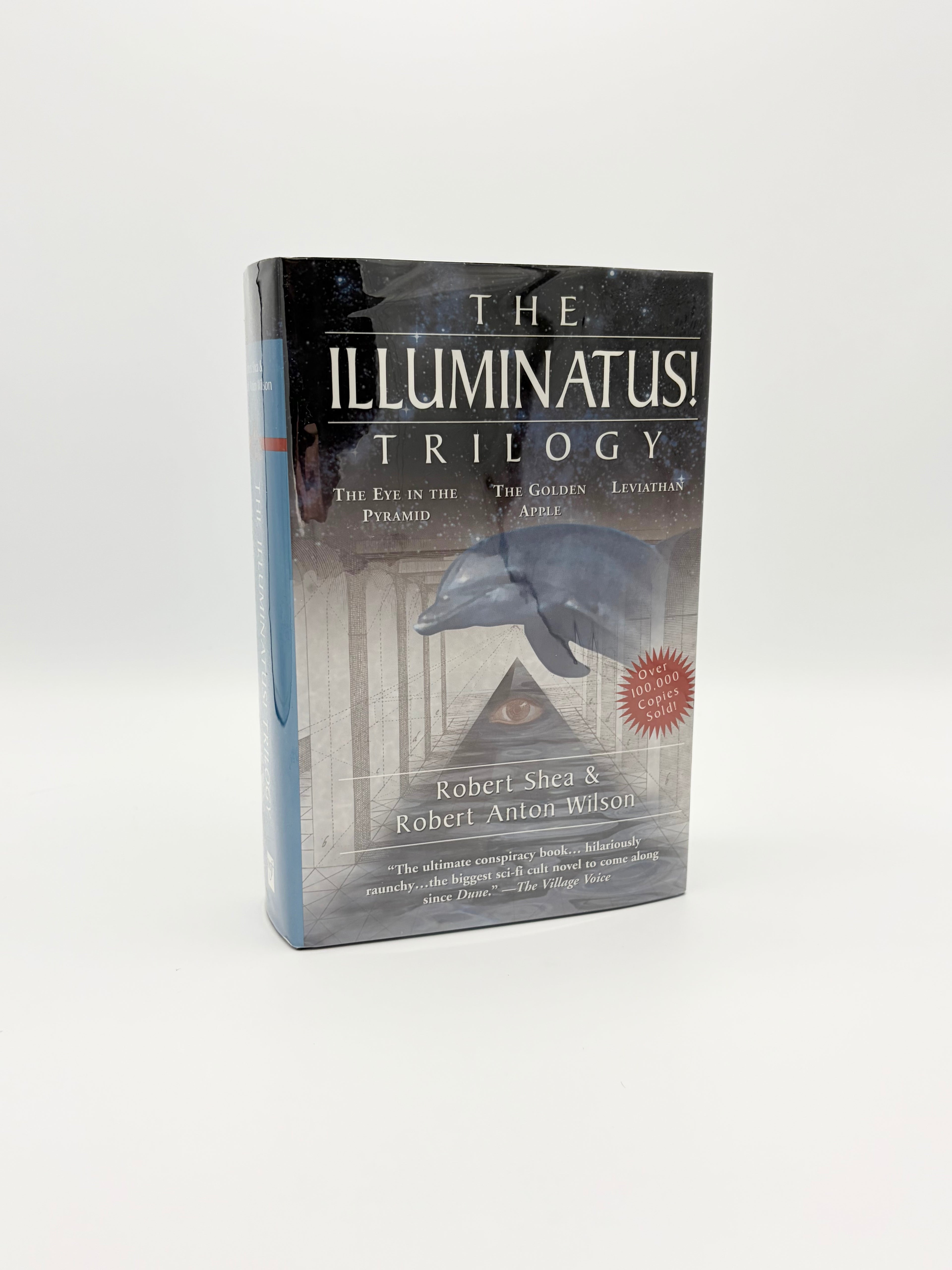The Illuminatus Trilogy by Robert Shea & Robert Anton Wilson
