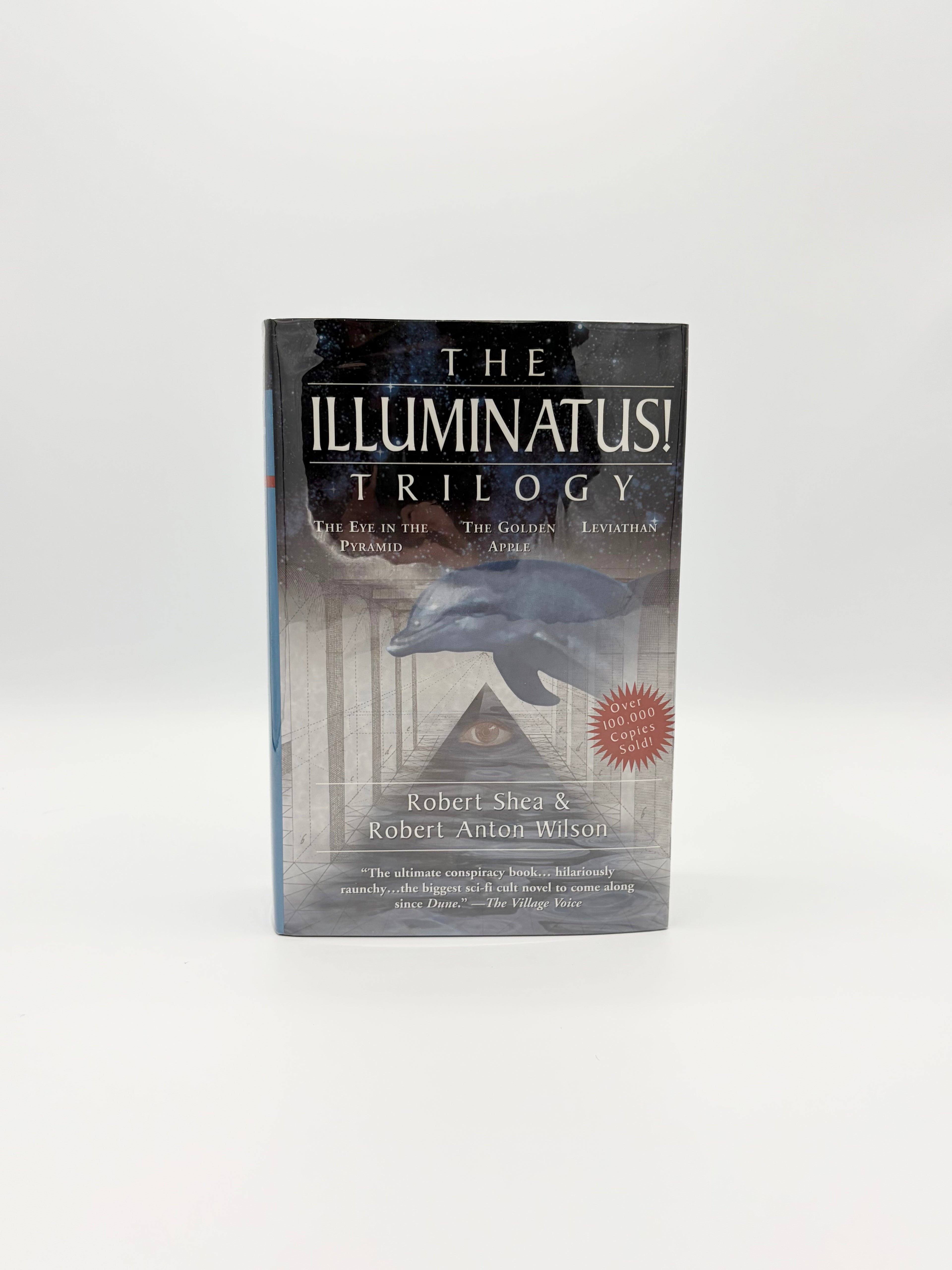 The Illuminatus Trilogy by Robert Shea & Robert Anton Wilson