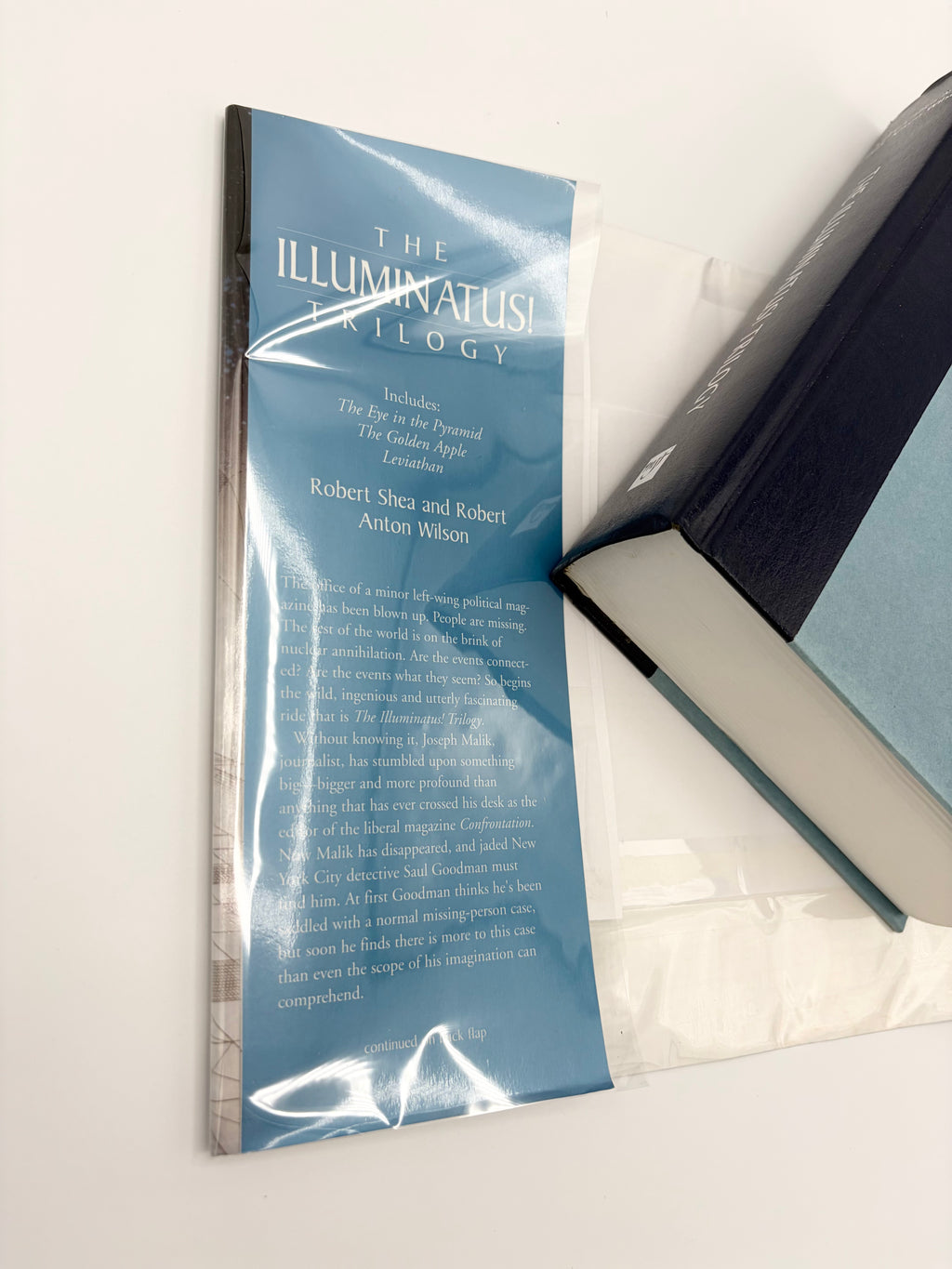 The Illuminatus Trilogy by Robert Shea & Robert Anton Wilson