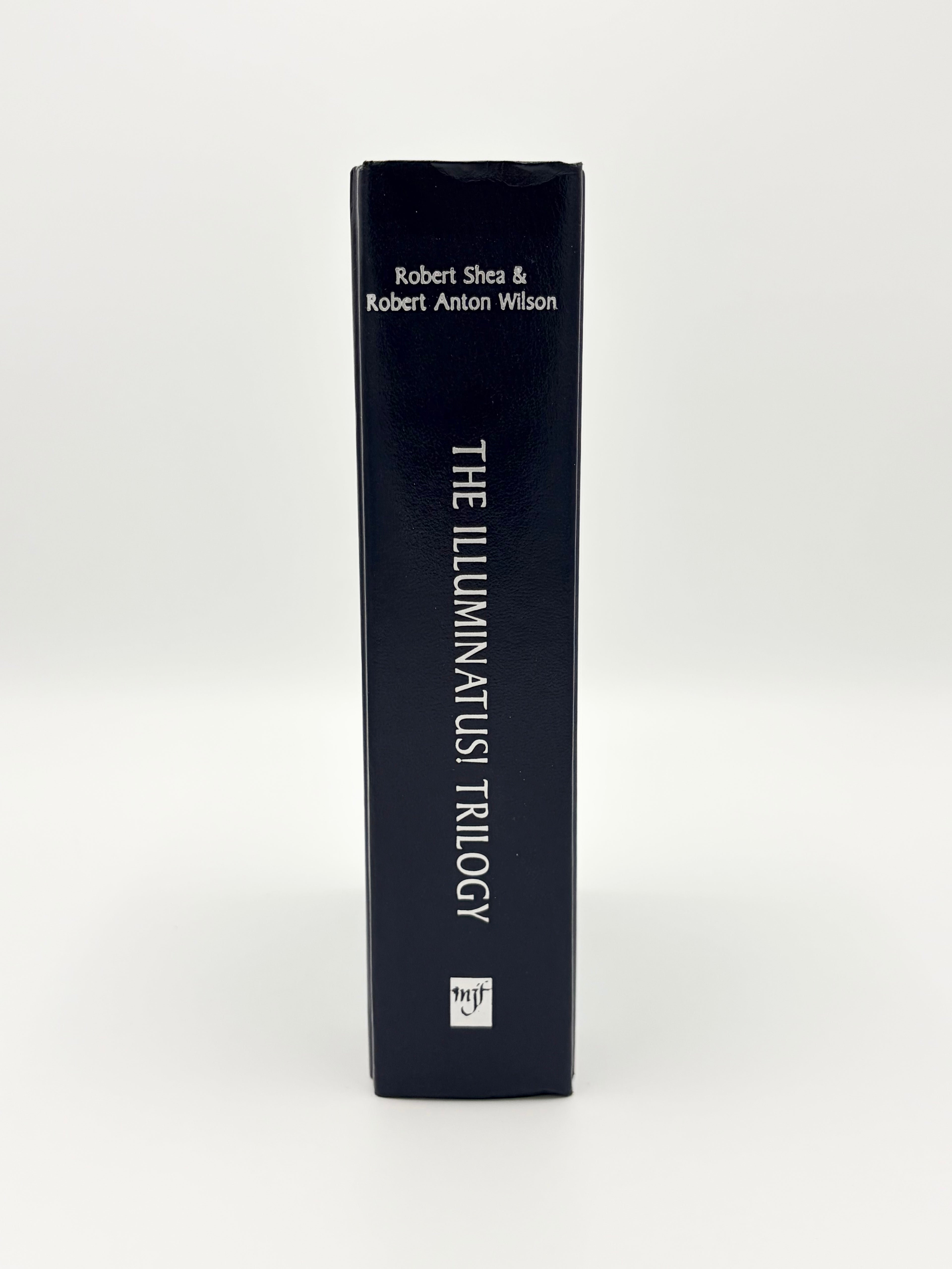 The Illuminatus Trilogy by Robert Shea & Robert Anton Wilson